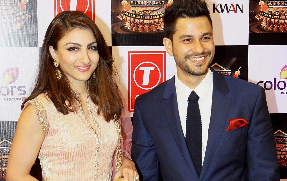 Bollywood actor Soha Ali Khan with her husband Kunal Khemu during a musical event of T Series in Mumbai.