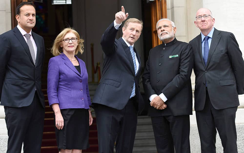 Prime Minister Narendra Modi with his Irish counterpart Enda Kenny on the steps of the Government Buildings in Dublin.