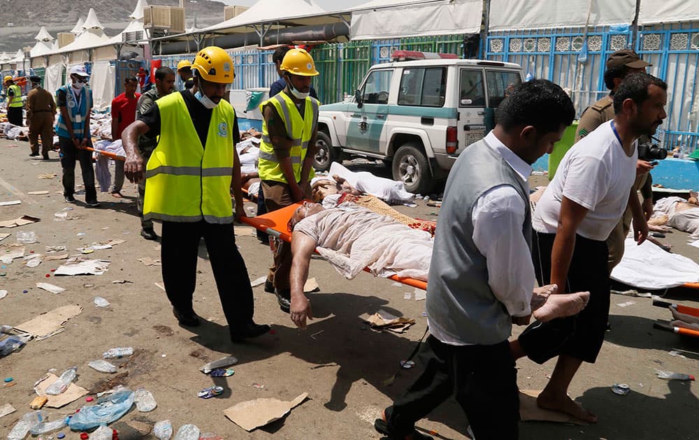 Emergency services attend to victims of a crush in Mina, Saudi Arabia during the annual hajj pilgrimage. Hundreds were killed and injured, Saudi authorities said. The crush happened in Mina, a large valley about five kilometers (three miles) from the holy city of Mecca that has been the site of hajj stampedes in years past.