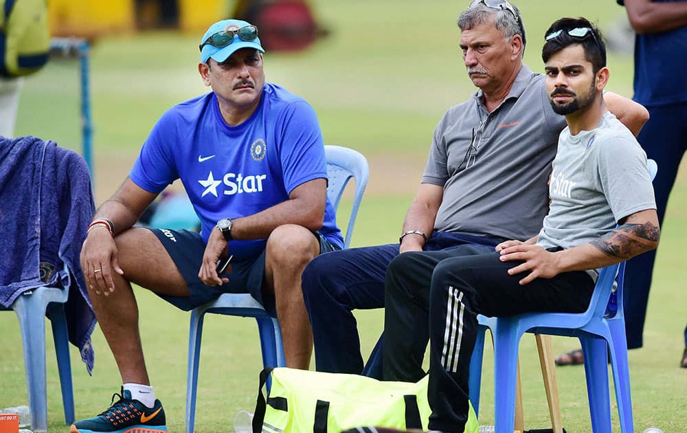 Indian Team Director Ravi Shashtri, Team Selector Roger Binny and Virat Kohli during the preparatory camp for the upcoming series against South Africa at NCA in Bengaluru.