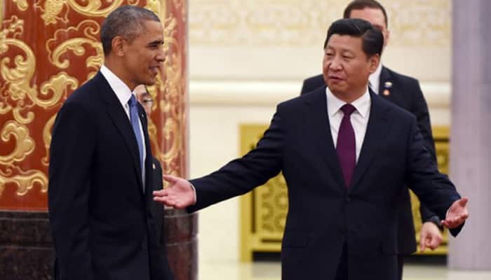 Obama greets Xi with `ni hao` and superpower supper