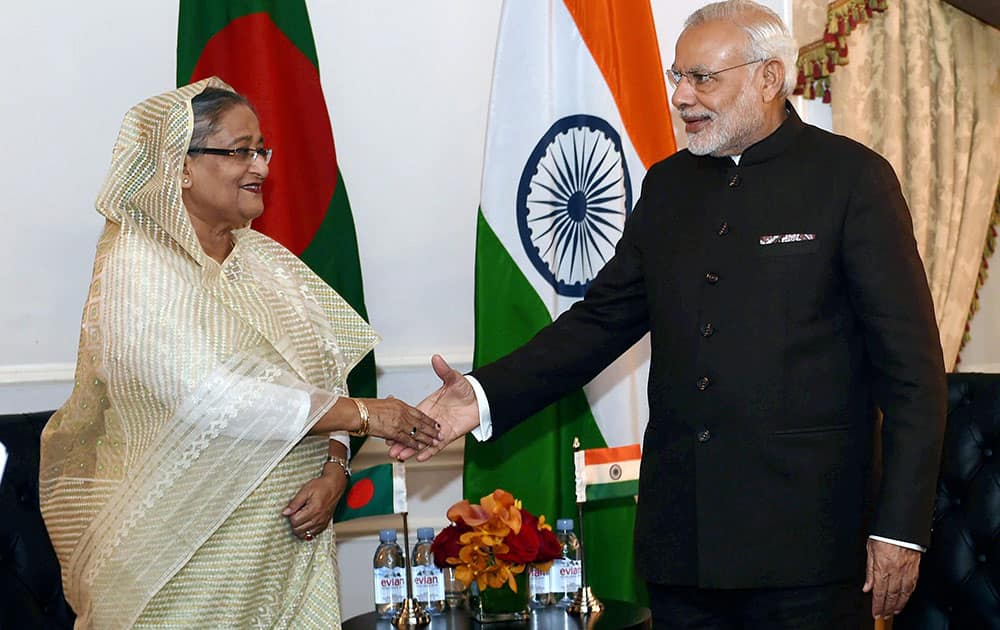 Prime Minister Narendra Modi shakes hands with his Bangladeshi counterpart Sheikh Hasina Wazed during a meeting in New York.