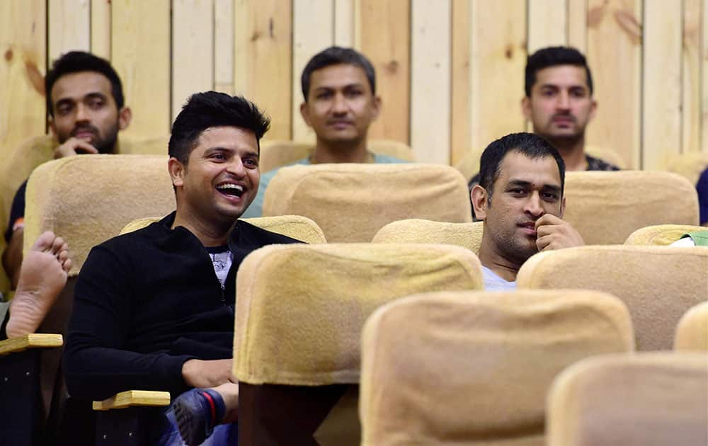 Cricketer M S Dhoni, Suresh Raina, Mohit Sharma and Coach Sanjay Bangar watch a Movie Kis Kis Se Pyar Karu starr popular comedian Kapil Sharma during an exclusive preview held for cricketers in Bengaluru.