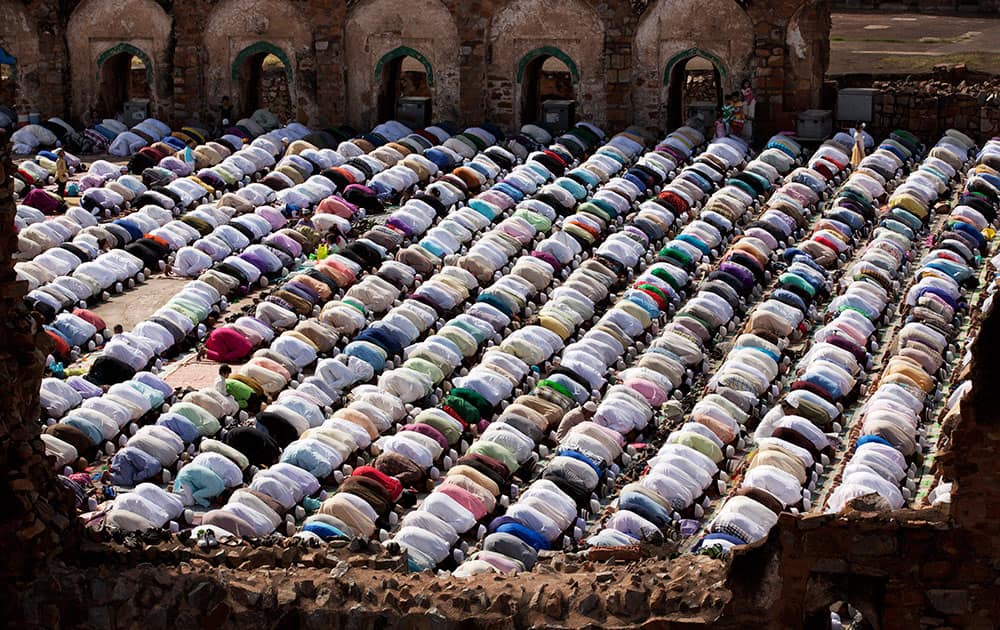 Muslims offer prayers at the Ferozshah Kotla mosque during Eid al-Adha in New Delhi.