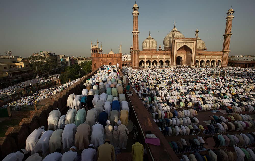 Muslims offer prayers at Jama Masjid during Eid al-Adha in New Delhi.