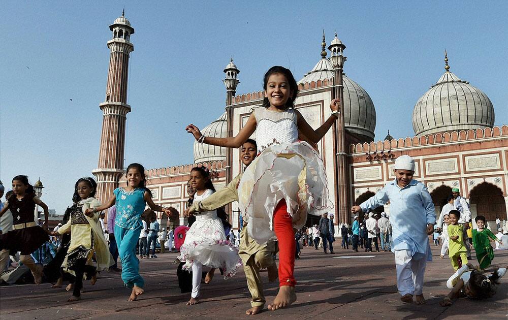 Muslim children jubilate at Jama Masjid on the occasion of Eid al-Adha at Jama Masjid in New Delhi.