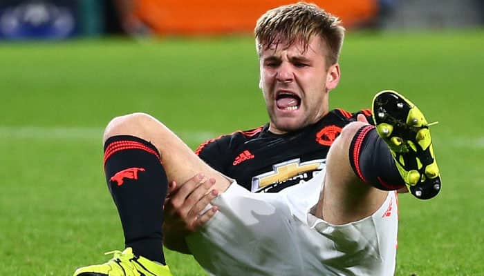 Manchester United&#039;s Luke Shaw out for at least six months, says Louis van Gaal