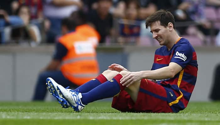 Barcelona&#039;s Lionel Messi limps off with injury against Las Palmas