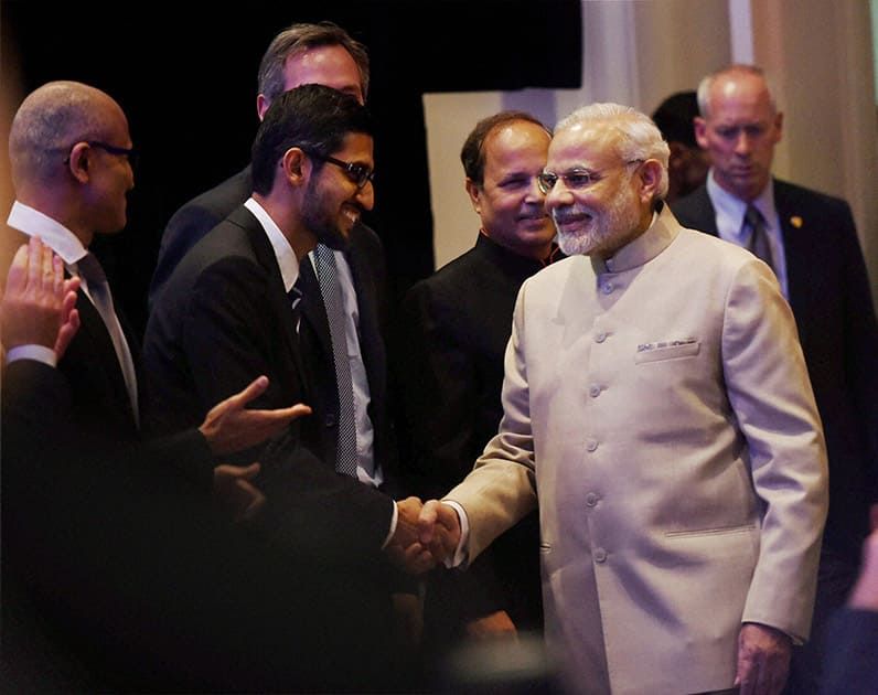 Prime Minister Narendra Modi shakes hands with Google CEO Sundar Pichai during the Digital India and Digital Technology dinner function in San Jose.