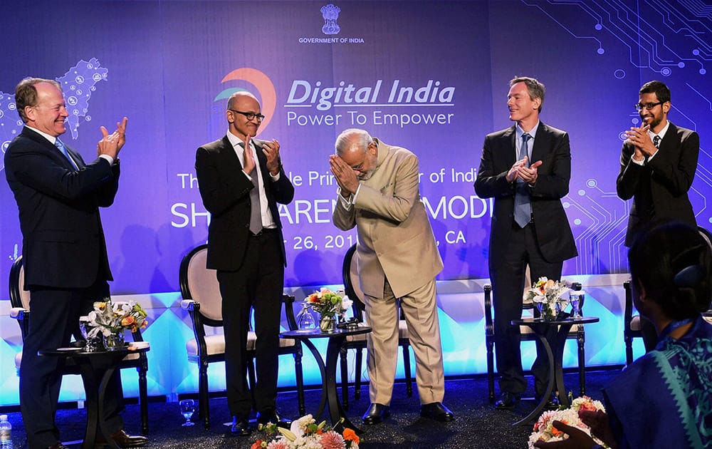 Prime Minister Narendra Modi with Microsoft CEO Satya Nadella (2nd L), John T. Chambers, Executive Chairman of Cisco, Paul E. Jacobs, Executive Chairman of Qualcomm and Google CEO Sundar Pichai (R) during the Digital India and Digital Technology dinner function in San Jose.