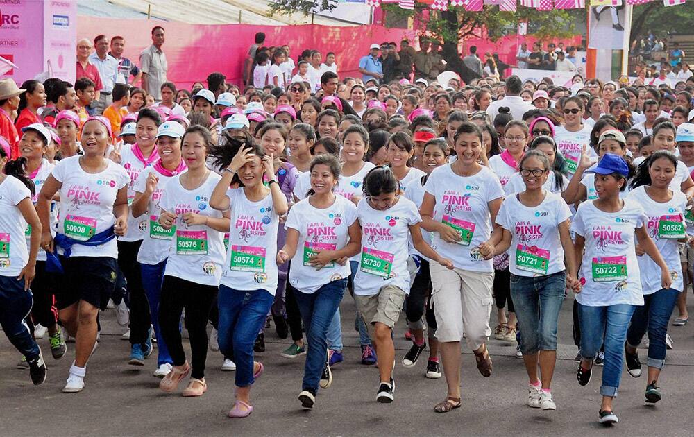 Girls taking part in the Pinkathon run organized to encourage women’s health and fitness in Guwahati.