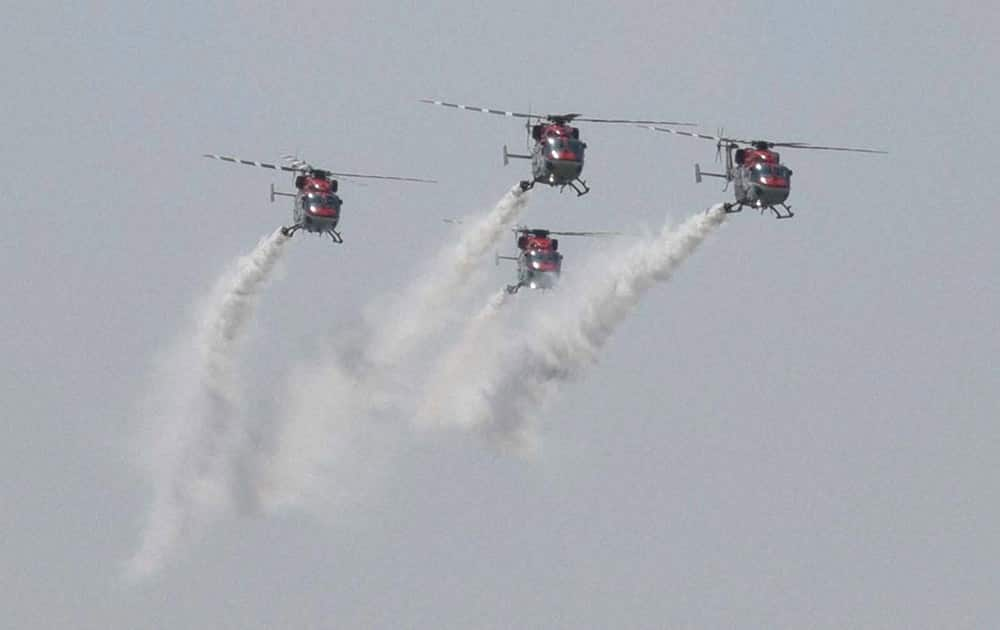 Indian Air Force’s Sarang helicopters perform during the 83rd Anniversary celebration of Indian Air Force at the ‘Air Fest-2015’ in Nagpur.