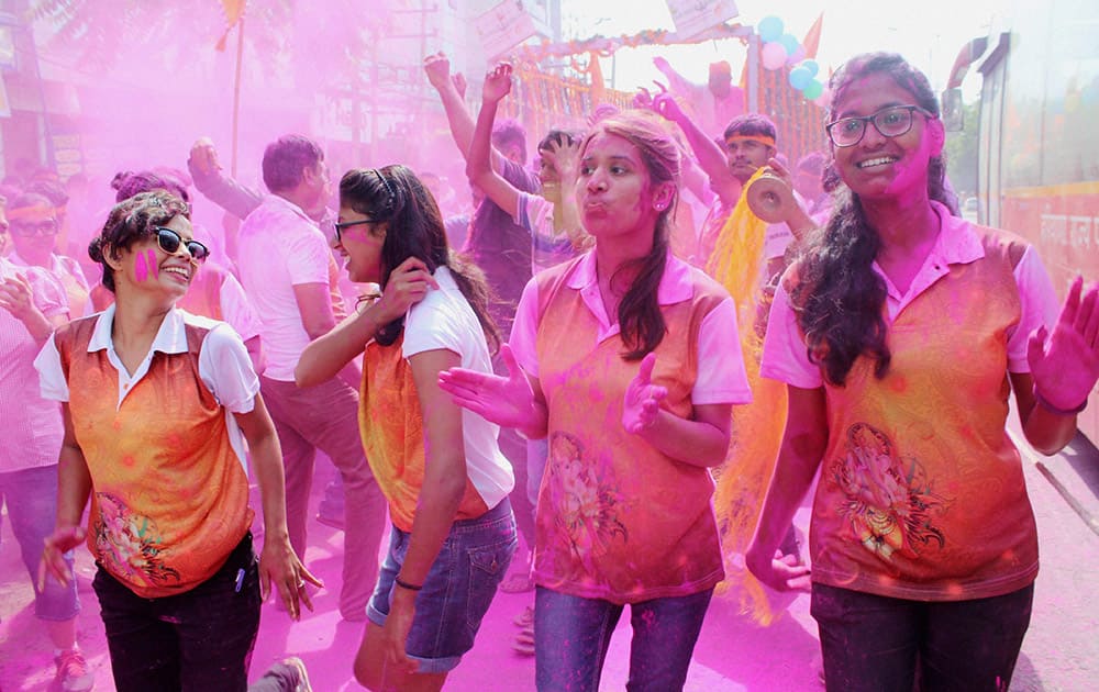 Devotees dance as they arrive to immerse Lord Ganeshas idol during Ganesh Chaturthi celebrations Damdma lake in Gurgaon.