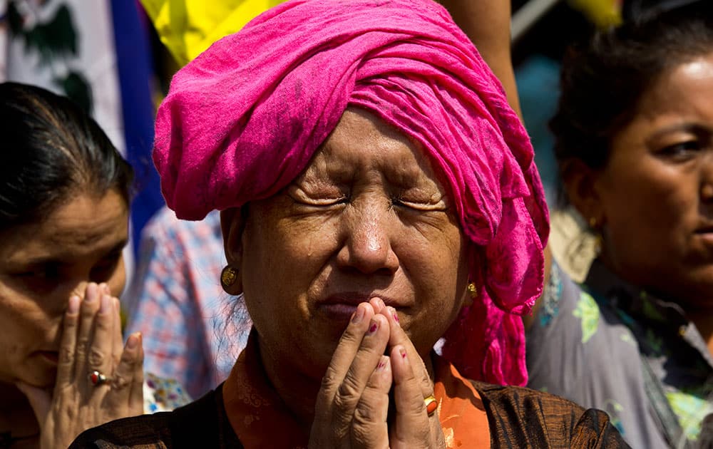 A Tibetan exile woman cries during a protest outside the United Nations' office in New Delhi.