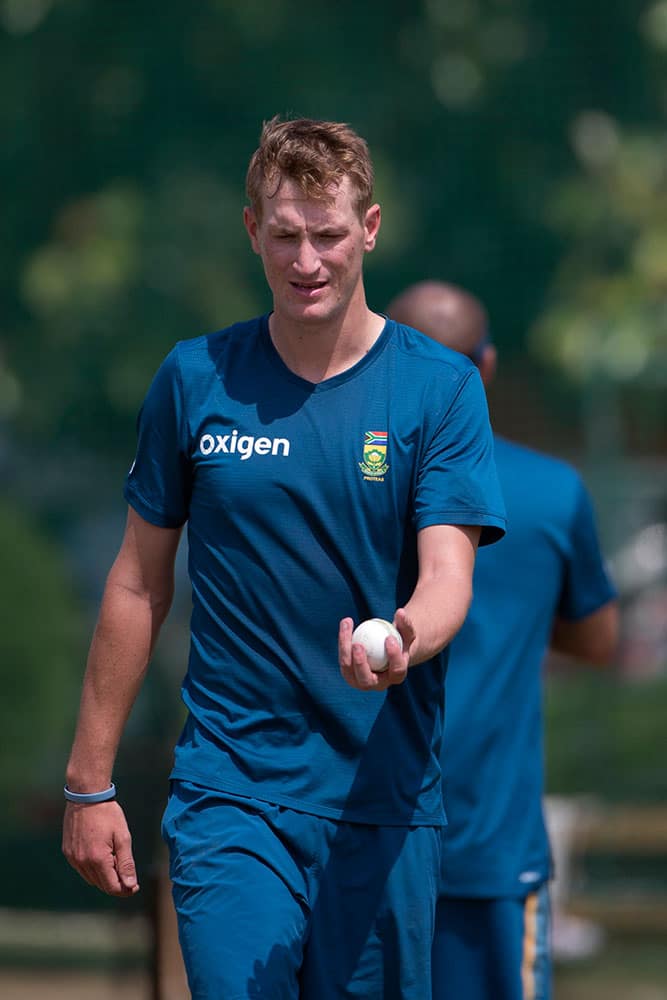 South Africa's Chris Morris prepares to bowl during a practice session in New Delhi, India.