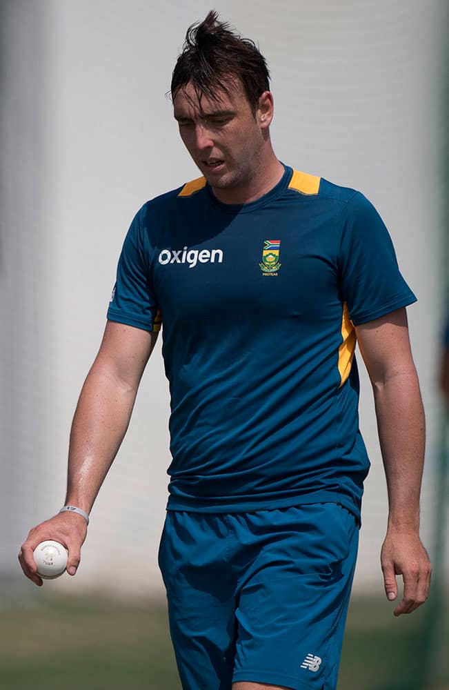 South Africa's Kyle Abbott prepares to bowl during a practice session in New Delhi.