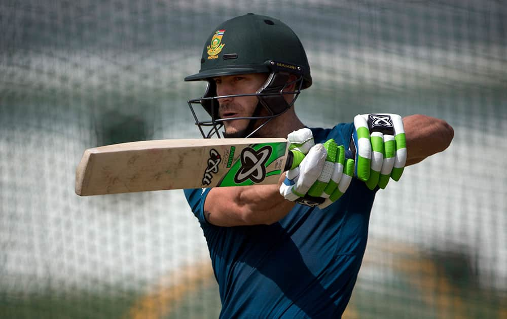 South African Twenty20 cricket team captain, Faf du Plessis, bats during a practice session in New Delhi.