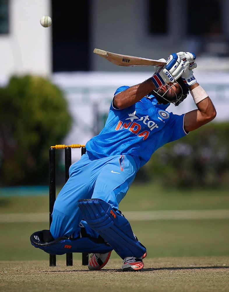 India A's Manan Vohra plays a ball against South Africa during a practice Twenty20 match in New Delhi.