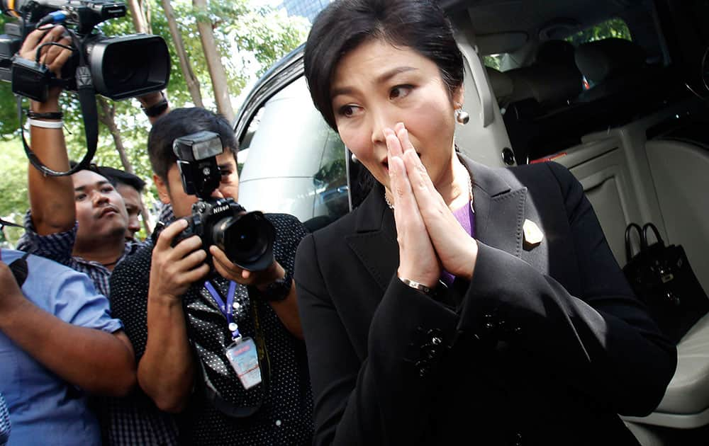 Thailand's former Prime Minister Yingluck Shinawatra leaves Bangkok's Criminal Court, Thailand.