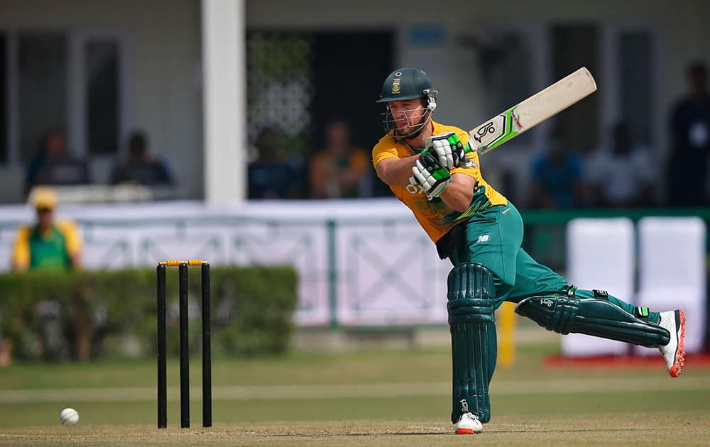 South African batsman AB de Villiers hits a ball against India A during a practice Twenty20 match in New Delhi.