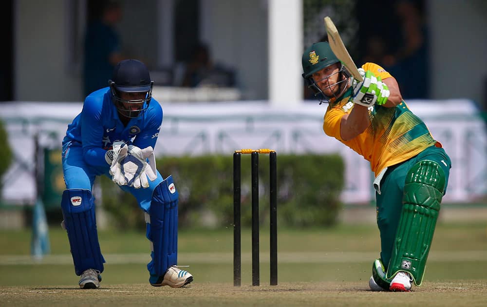 South African batsman Faf du Plessis hits a ball against India A during a practice Twenty20 match in New Delhi.