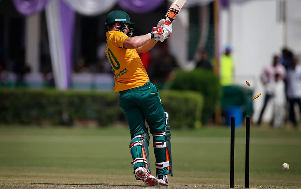 South African batsman David Miller is bowled while playing against India A during a practice Twenty20 match in New Delhi.