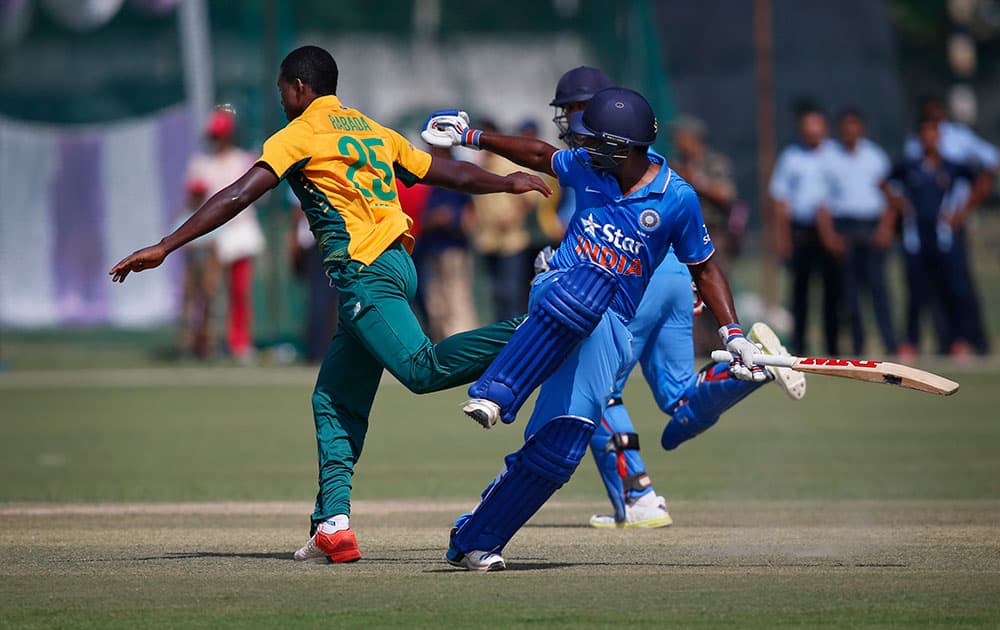 India A player Sanju Samson reacts after a mid pitch collision with South Africa's Kagiso Rabada during a practice Twenty20 match in New Delhi.