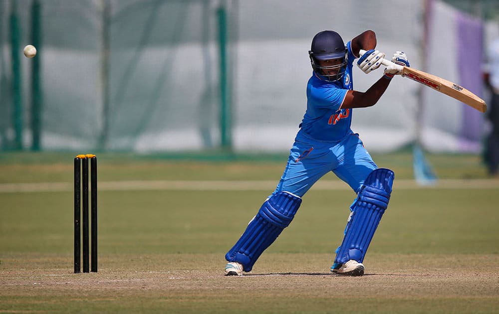 India A's batsman Sanju Samson hits a ball against South Africa during a practice Twenty20 match in New Delhi.