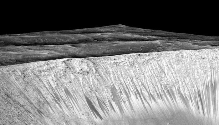 Picture: Dark, recurring streaks on walls of Garni Crater on Mars
