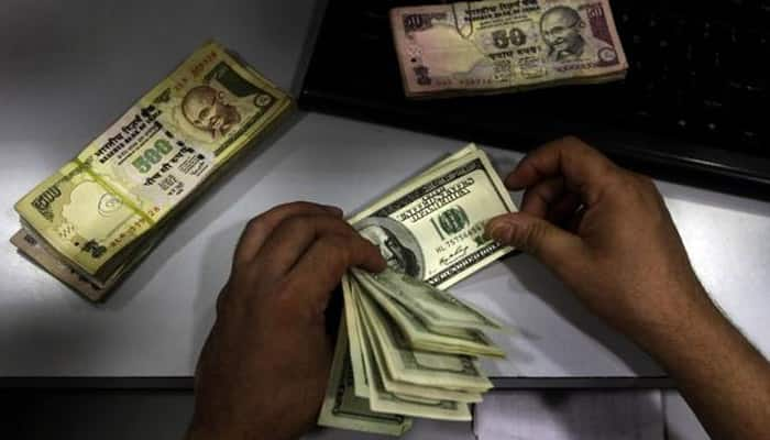 Rupee gains 19 paise at 65.77 against US dollar 