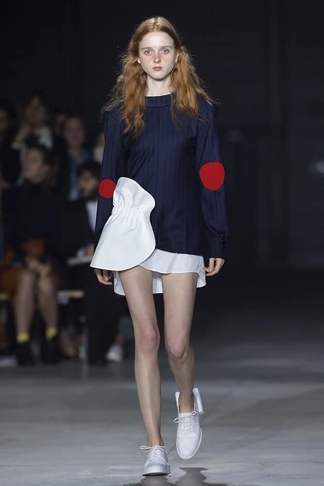 A model wears a creation by French designer Simon Porte for Jacquemus, as part of his Spring-Summer 2016 ready-to-wear fashion collection, in Paris.