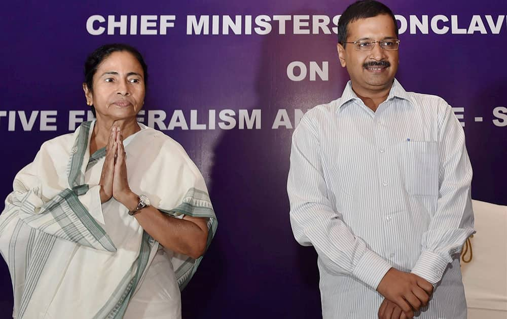 Delhi Chief Minister Arvind Kejriwal and West Bengal Chief Minister Mamata Banerjee during Chief Ministers Conclave on Cooperatve Federalism and Centre-State Relations in New Delhi.