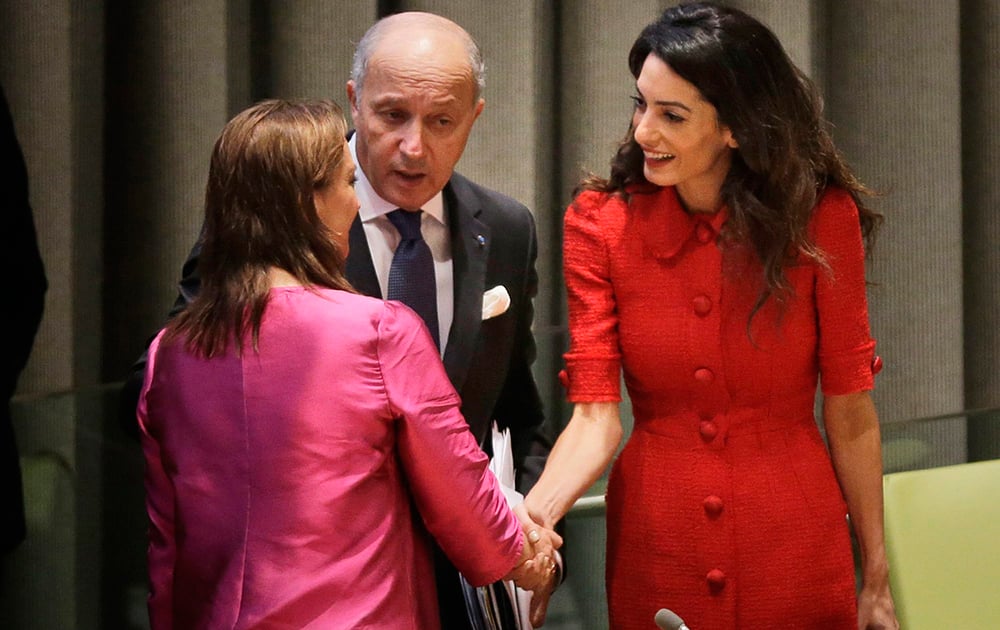 Amal Clooney, greets Mexicos FM Claudia Ruiz Massieu and Frances FM Laurent Fabius before a meet 'Framing the veto in event of mass atrocities' at UN HQ.