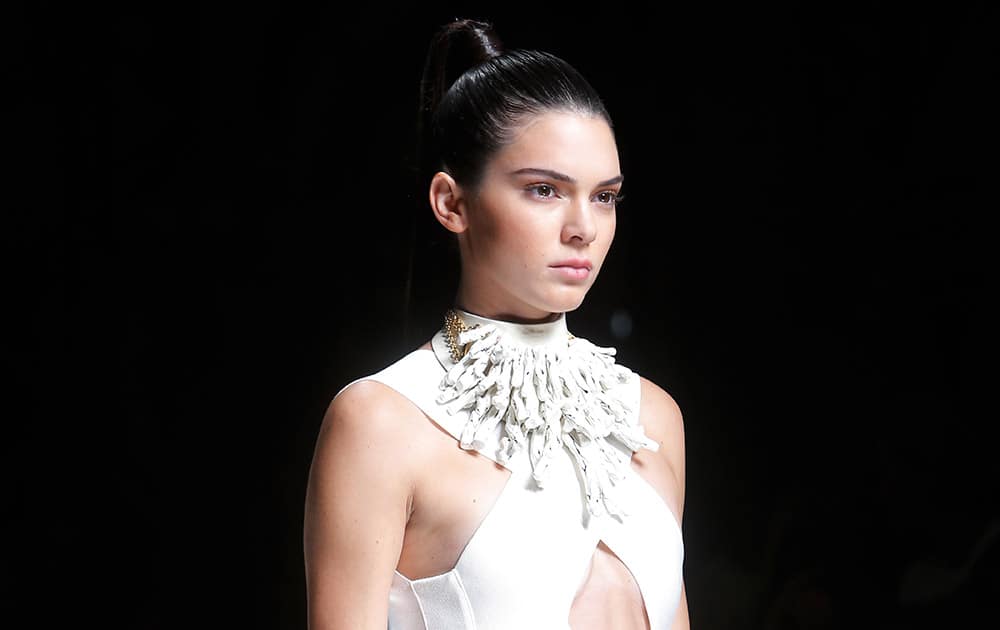 Kendall Jenner wears a creation for Balmain as part of his Spring-Summer 2016 ready-to-wear fashion collection, presented during the Paris Fashion Week, in Paris.