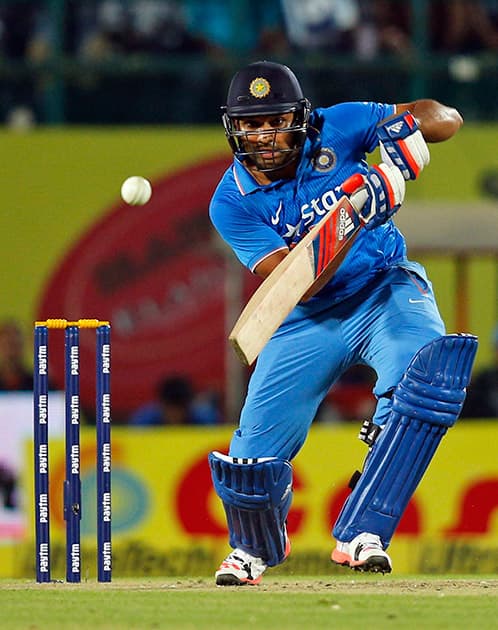 Rohit Sharma bats during the first Twenty20 cricket match against South Africa in Dharmsala.