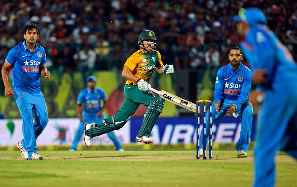 South Africa's Farhaan Behardien takes a run during the first Twenty20 cricket match against India in Dharmsala.
