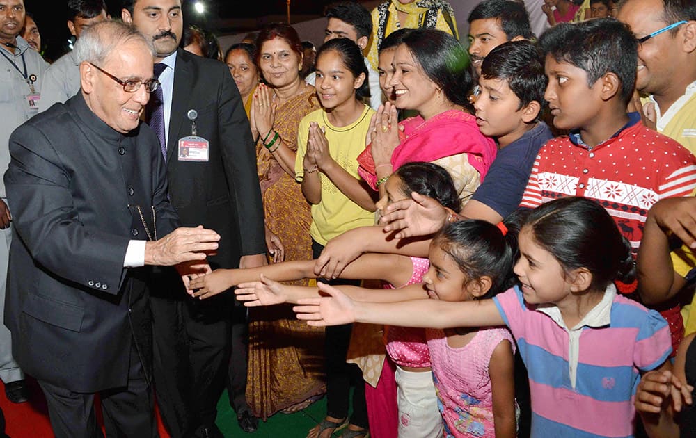 President Pranab Mukherjee meeting children at the inauguration of a Food Festival on the occasion of Gandhi Jayanti at President’s Estate in New Delhi.