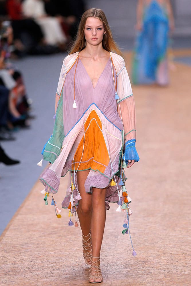 A model wears a creation for Chloe as part of her Spring-Summer 2016 ready-to-wear fashion collection, presented during the Paris Fashion Week in Paris.