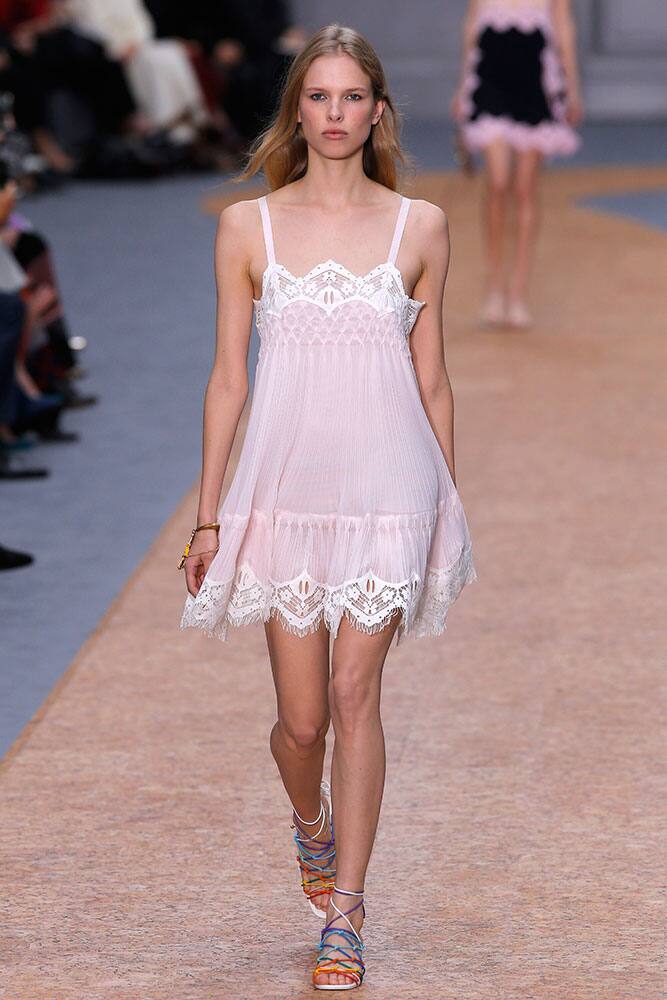 A model wears a creation for Chloe as part of her Spring-Summer 2016 ready-to-wear fashion collection, presented during the Paris Fashion Week in Paris.