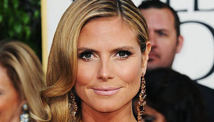 Watch: Heidi Klum&#039;s all plastered up for Halloween!