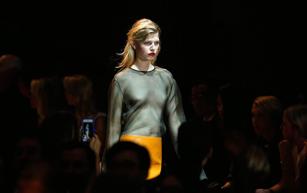 A model wears a creation for Nina Ricci's Spring-Summer 2016 ready-to-wear fashion collection, presented during the Paris Fashion Week in Paris.