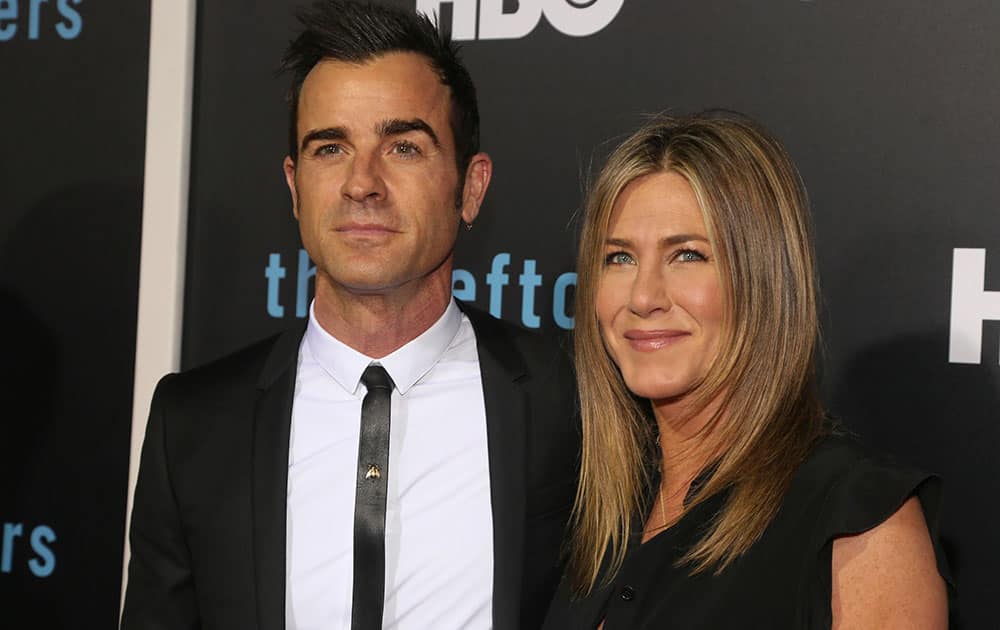 Justin Theroux and Jennifer Aniston arrive at the second season premiere of 