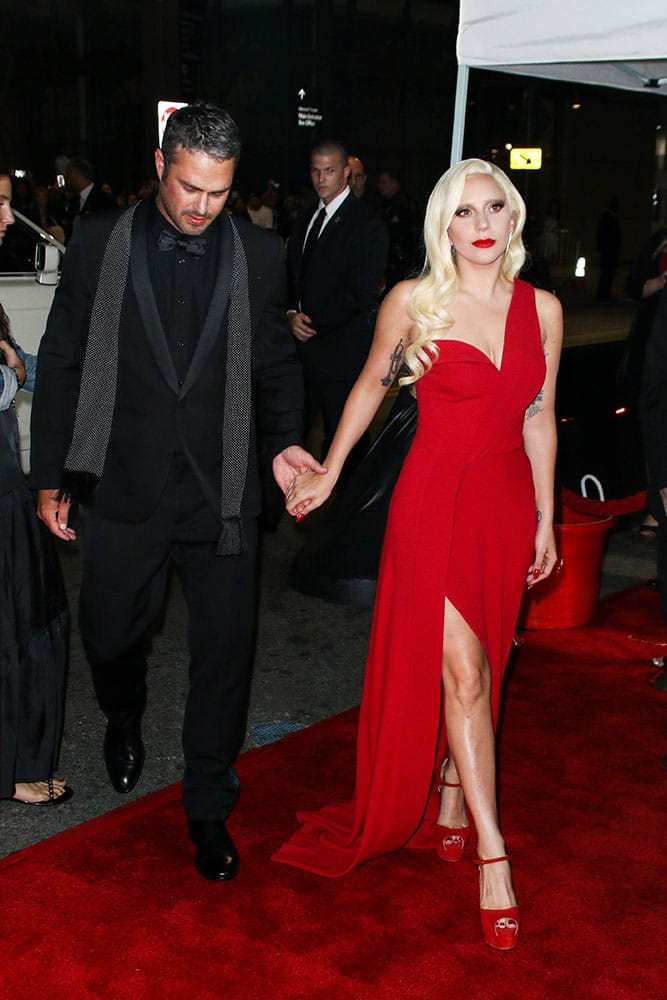 Taylor Kinney and Lady Gaga attend the LA Premiere Screening of 