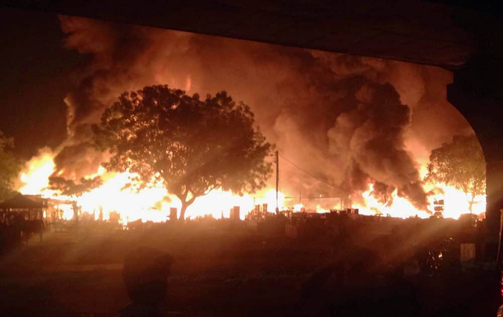 A scene of the fire in which more than 30 shops were burned on Saturday night at Sikandepur furniture in Gurgaon.
