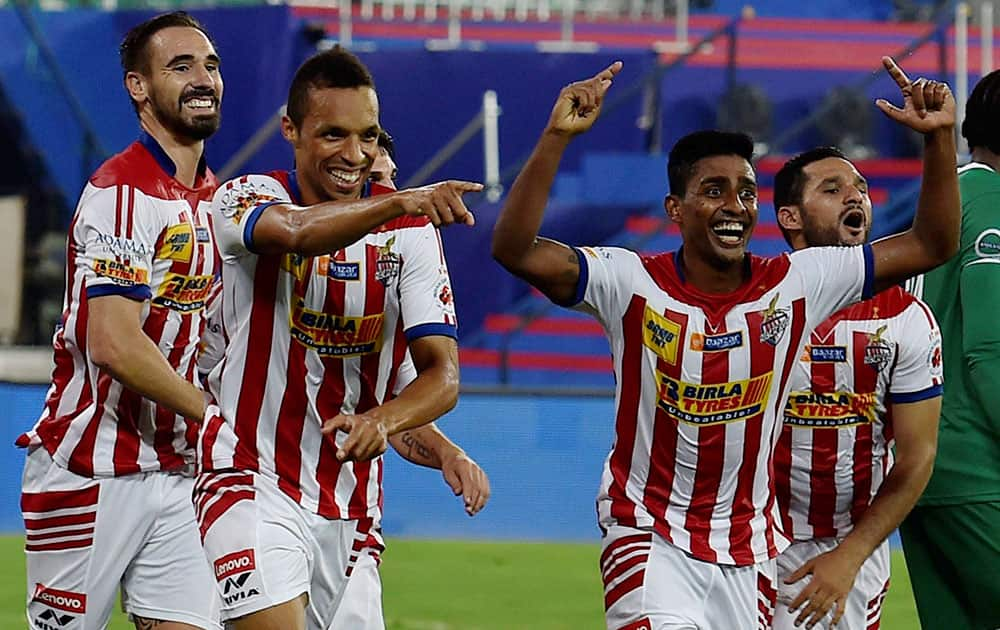 Players of Atletico de Kolkata celebrate after winning the match against Chennaiyin FC during the ISL Match 2015 at Jawaharlal Nehru Stadium in Chennai.