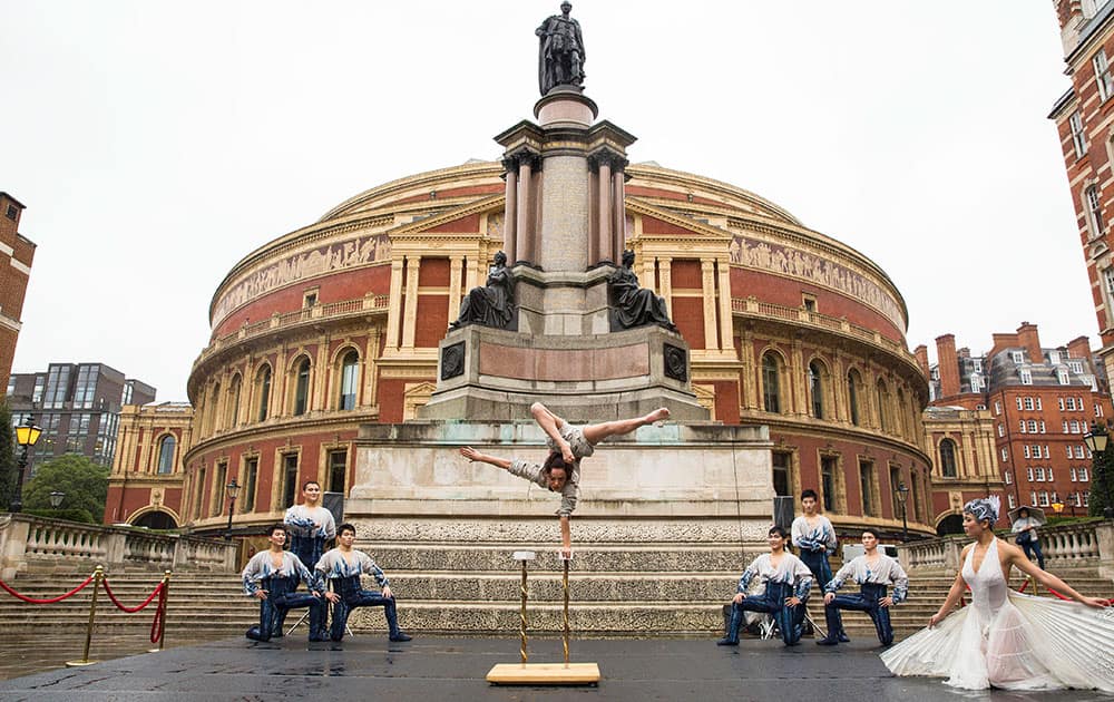 A Cirque du Soleil performer dances on a stage during a photo call in front of the Royal Albert Hall ahead of the show's 20th anniversary. The Cirque du Soleil show, Amaluna, opens at the venue on January 16, 2016 and features a predominately female cast and all-female band.