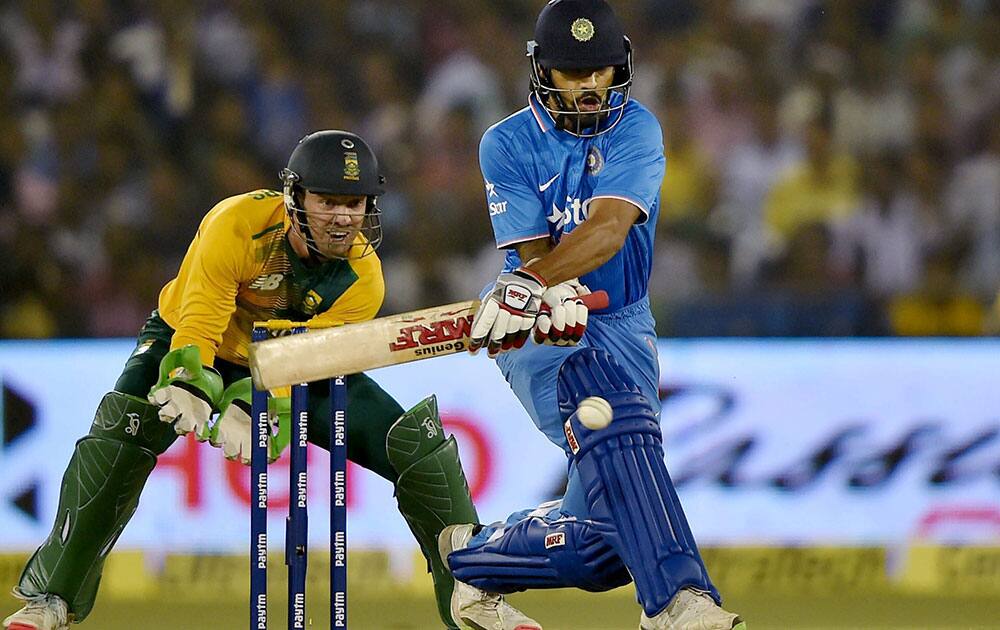 S.Dhawan plays a shot during the first T20 match against South Africa at Barabati Stadium in Cuttack.