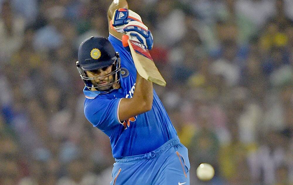 Rohit Sharma plays a shot during the first T20 match against South Africa at Barabati Stadium in Cuttack.