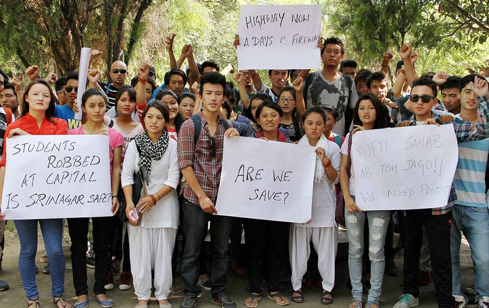 Members of the All Ladakh Students Association shout slogans during a demonstration in Jammu.