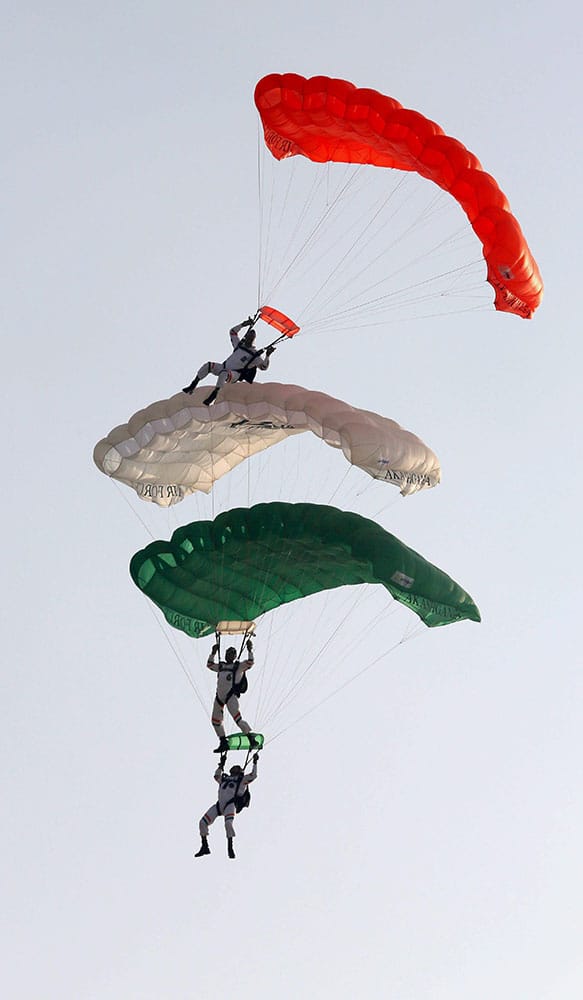 IAF paratroopers perform during the the full dress rehearsal for the Air Force Day function at Air Force Station Hindon in Ghaziabad.
